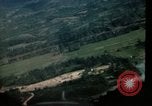 Image of air strikes on road intersection Vietnam, 1967, second 44 stock footage video 65675071012