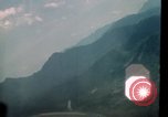 Image of air strikes on road intersection Vietnam, 1967, second 46 stock footage video 65675071012