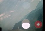 Image of air strikes on road intersection Vietnam, 1967, second 47 stock footage video 65675071012