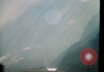 Image of air strikes on road intersection Vietnam, 1967, second 48 stock footage video 65675071012