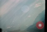 Image of air strikes on road intersection Vietnam, 1967, second 49 stock footage video 65675071012