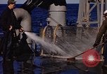 Image of penguins Antarctic Ocean, 1947, second 34 stock footage video 65675071021