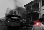 Image of car bombing of U.S. Embassy Saigon Vietnam, 1965, second 25 stock footage video 65675071041
