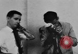 Image of car bombing of U.S. Embassy Saigon Vietnam, 1965, second 29 stock footage video 65675071041