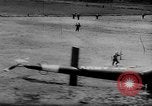 Image of Viet Cong attack U.S.soldiers in crashed helicopter Vietnam, 1965, second 10 stock footage video 65675071042