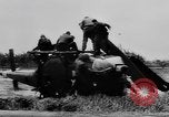 Image of Viet Cong attack U.S.soldiers in crashed helicopter Vietnam, 1965, second 13 stock footage video 65675071042