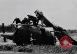 Image of Viet Cong attack U.S.soldiers in crashed helicopter Vietnam, 1965, second 15 stock footage video 65675071042
