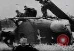 Image of Viet Cong attack U.S.soldiers in crashed helicopter Vietnam, 1965, second 19 stock footage video 65675071042