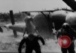 Image of Viet Cong attack U.S.soldiers in crashed helicopter Vietnam, 1965, second 21 stock footage video 65675071042