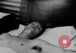 Image of Viet Cong attack U.S.soldiers in crashed helicopter Vietnam, 1965, second 31 stock footage video 65675071042