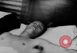 Image of Viet Cong attack U.S.soldiers in crashed helicopter Vietnam, 1965, second 32 stock footage video 65675071042