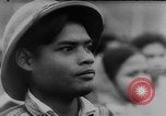 Image of Viet Cong attack U.S.soldiers in crashed helicopter Vietnam, 1965, second 62 stock footage video 65675071042