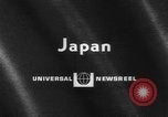 Image of twin typhoons Japan, 1966, second 5 stock footage video 65675071045