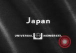 Image of twin typhoons Japan, 1966, second 6 stock footage video 65675071045