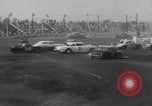 Image of auto stunt Islip New York USA, 1966, second 20 stock footage video 65675071047