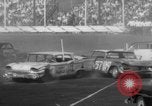 Image of auto stunt Islip New York USA, 1966, second 32 stock footage video 65675071047