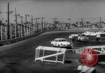 Image of auto stunt Islip New York USA, 1966, second 56 stock footage video 65675071047