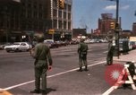 Image of United States soldiers on Guard duty in City Detroit Michigan USA, 1967, second 4 stock footage video 65675071096