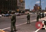 Image of United States soldiers on Guard duty in City Detroit Michigan USA, 1967, second 6 stock footage video 65675071096