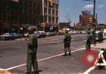 Image of United States soldiers on Guard duty in City Detroit Michigan USA, 1967, second 7 stock footage video 65675071096