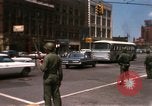 Image of United States soldiers on Guard duty in City Detroit Michigan USA, 1967, second 12 stock footage video 65675071096
