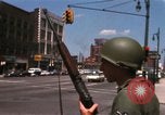 Image of United States soldiers on Guard duty in City Detroit Michigan USA, 1967, second 17 stock footage video 65675071096