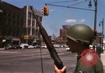 Image of United States soldiers on Guard duty in City Detroit Michigan USA, 1967, second 18 stock footage video 65675071096