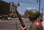 Image of United States soldiers on Guard duty in City Detroit Michigan USA, 1967, second 19 stock footage video 65675071096