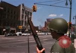 Image of United States soldiers on Guard duty in City Detroit Michigan USA, 1967, second 20 stock footage video 65675071096