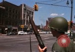 Image of United States soldiers on Guard duty in City Detroit Michigan USA, 1967, second 21 stock footage video 65675071096