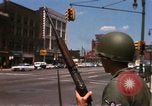Image of United States soldiers on Guard duty in City Detroit Michigan USA, 1967, second 23 stock footage video 65675071096