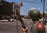 Image of United States soldiers on Guard duty in City Detroit Michigan USA, 1967, second 24 stock footage video 65675071096