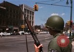 Image of United States soldiers on Guard duty in City Detroit Michigan USA, 1967, second 27 stock footage video 65675071096