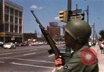 Image of United States soldiers on Guard duty in City Detroit Michigan USA, 1967, second 28 stock footage video 65675071096