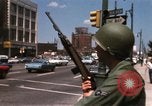 Image of United States soldiers on Guard duty in City Detroit Michigan USA, 1967, second 35 stock footage video 65675071096