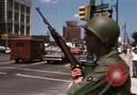 Image of United States soldiers on Guard duty in City Detroit Michigan USA, 1967, second 39 stock footage video 65675071096
