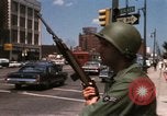 Image of United States soldiers on Guard duty in City Detroit Michigan USA, 1967, second 41 stock footage video 65675071096