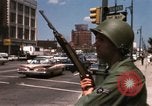 Image of United States soldiers on Guard duty in City Detroit Michigan USA, 1967, second 44 stock footage video 65675071096