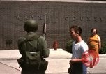 Image of United States soldiers on Guard duty in City Detroit Michigan USA, 1967, second 47 stock footage video 65675071096