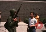 Image of United States soldiers on Guard duty in City Detroit Michigan USA, 1967, second 51 stock footage video 65675071096