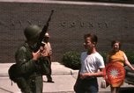 Image of United States soldiers on Guard duty in City Detroit Michigan USA, 1967, second 55 stock footage video 65675071096