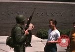 Image of United States soldiers on Guard duty in City Detroit Michigan USA, 1967, second 58 stock footage video 65675071096