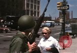Image of United States soldiers on Guard duty in City Detroit Michigan USA, 1967, second 62 stock footage video 65675071096