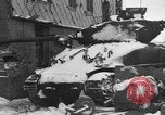 Image of US Soldiers examine damaged US M4 and German Panther tank Sterpigny Belgium, 1945, second 8 stock footage video 65675071156