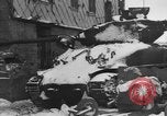 Image of US Soldiers examine damaged US M4 and German Panther tank Sterpigny Belgium, 1945, second 10 stock footage video 65675071156
