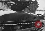 Image of US Soldiers examine damaged US M4 and German Panther tank Sterpigny Belgium, 1945, second 11 stock footage video 65675071156