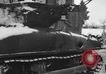 Image of US Soldiers examine damaged US M4 and German Panther tank Sterpigny Belgium, 1945, second 12 stock footage video 65675071156