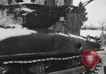 Image of US Soldiers examine damaged US M4 and German Panther tank Sterpigny Belgium, 1945, second 13 stock footage video 65675071156