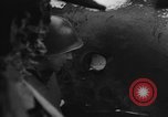 Image of US Soldiers examine damaged US M4 and German Panther tank Sterpigny Belgium, 1945, second 18 stock footage video 65675071156