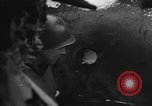 Image of US Soldiers examine damaged US M4 and German Panther tank Sterpigny Belgium, 1945, second 19 stock footage video 65675071156